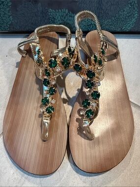 Gold T-Strap Sandals with Emerald Gem Accents